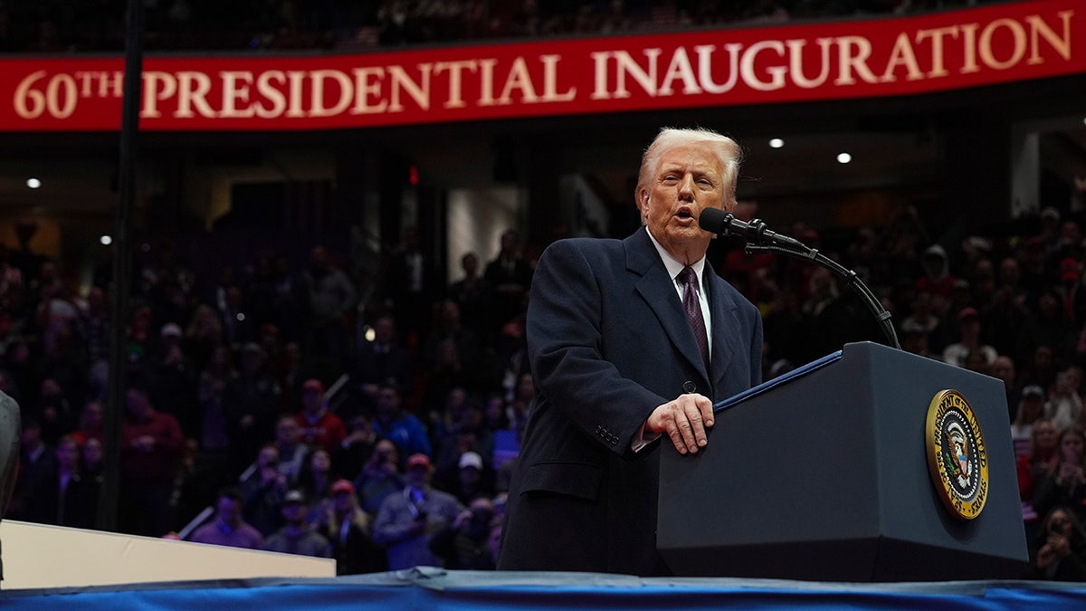 President Donald Trump speaks at an indoor Presidential Inauguration parade event at Capital One Arena