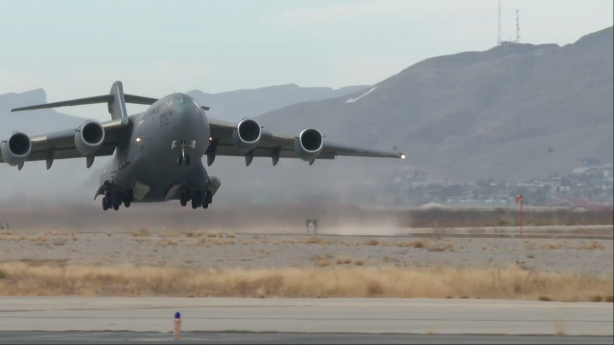 military plane taking off