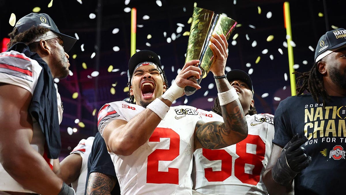 Emeka Egbuka with trophy