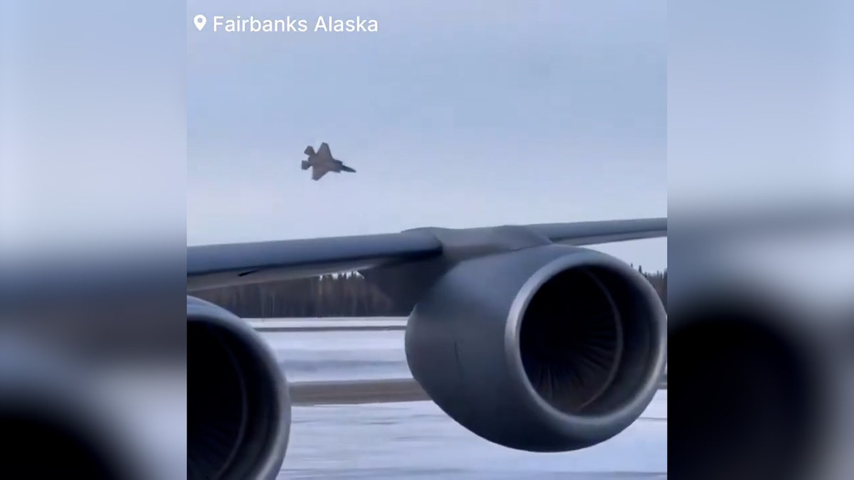 An F-35 fighter jet spirals toward the ground.