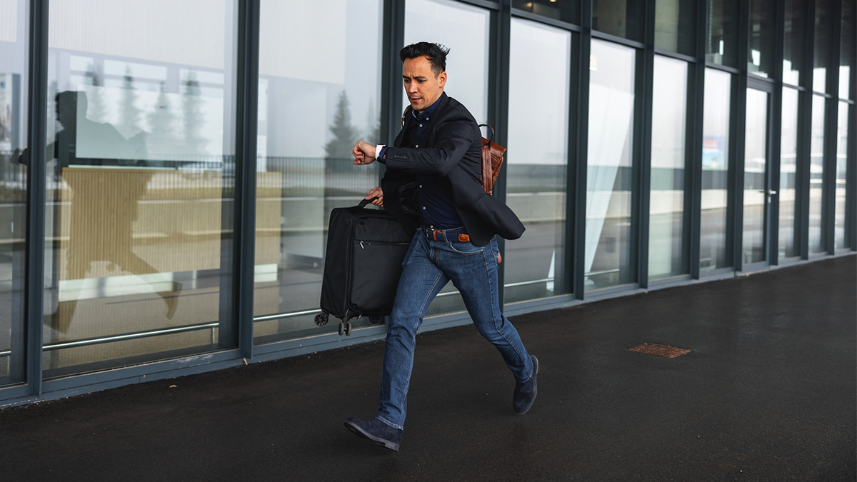 flight passenger rushing through airport