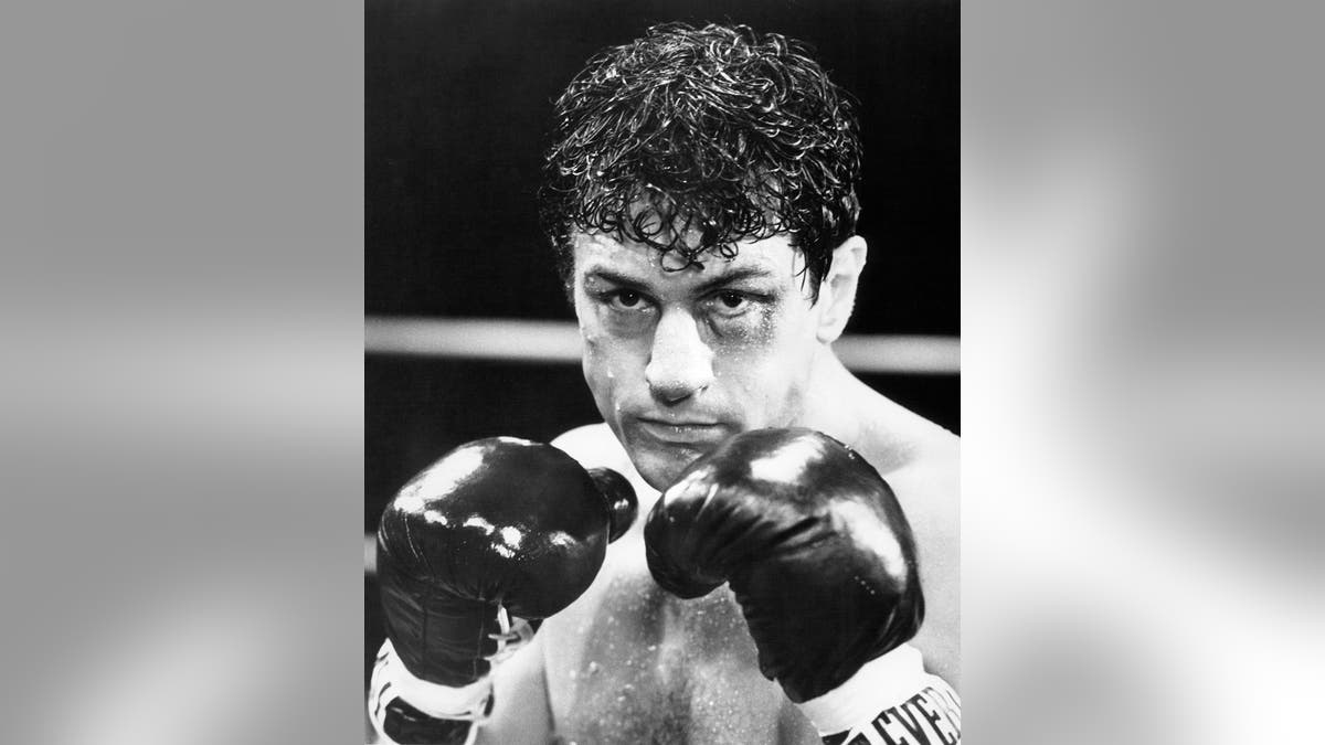 Robert De Niro in a close-up boxing stance.