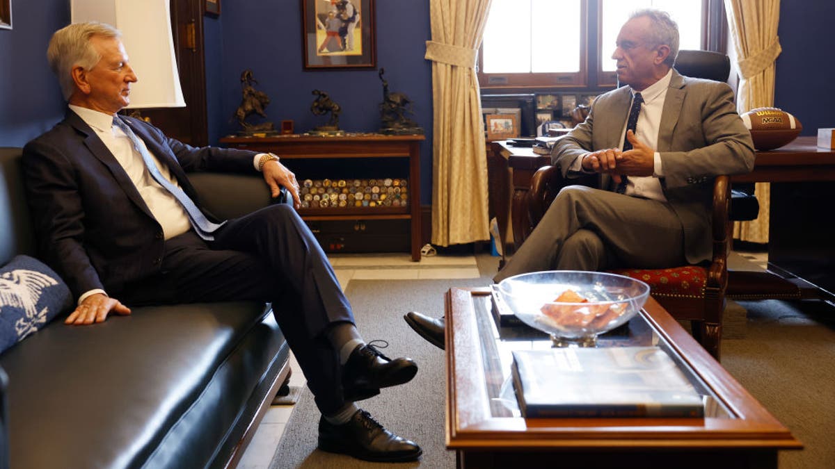 Robert F. Kennedy Jr., right, President-elect Donald Trump's nominee to be secretary of Health and Human Services, meets with the office of Sen. Tommy Tuberville (R-AL) in the Senate Office Building on December 17, 2024 in Washington, DC