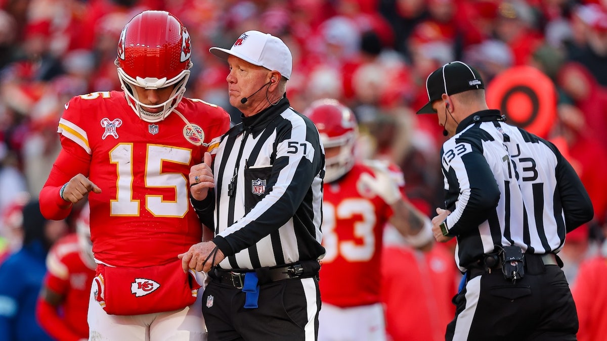 Referee Carl Cheffers speaks to Chiefs quarterback Patrick Mahomes during a break in the third quarter against the Houston Texans on Dec. 21, 2024, in Kansas City, Mo.