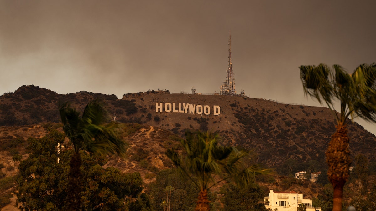 Wildfire smoke billows over Hollywood sign