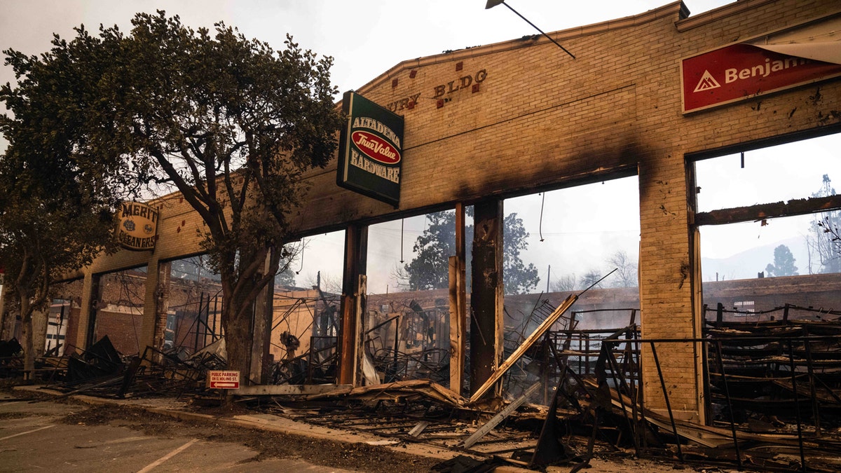 ALTADENA, CA - JANUARY 08: Altadena Hardware's brick frame is still standing on Wednesday, January 8, 2025 after the Eaton's caught fire in downtown Altadena. More than 1,000 structures burned, and two people died, in wildfires fueled by intense Santa Ana winds across Los Angeles County. (Photo by Sarah Ringwertz/MediaNews Group/Los Angeles Daily News via Getty Images)