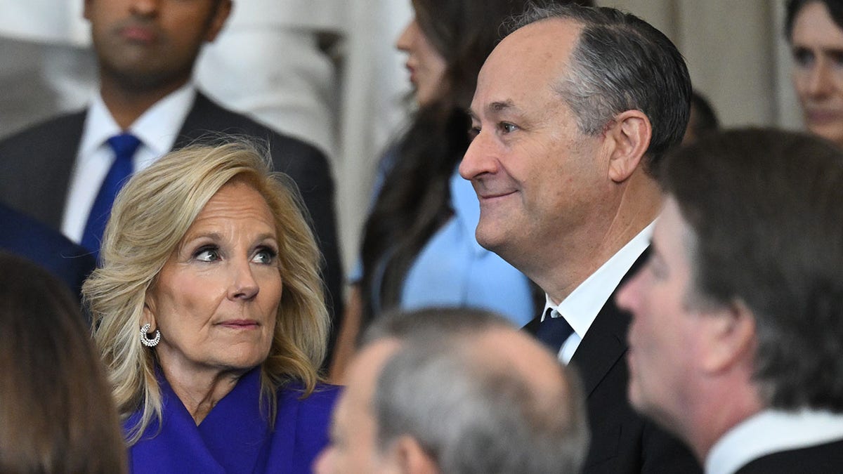 Jill Biden looks at Doug Emhoff during Trump inauguration