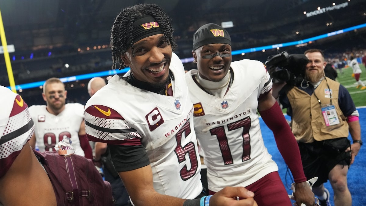 Jayden Daniels #5 of the Washington Commanders celebrates with Terry McLaurin #17 aft  defeating the Detroit Lions 45-31 successful  the NFC Divisional Playoff astatine  Ford Field connected  January 18, 2025 successful  Detroit, Michigan.  