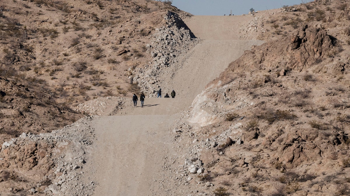 People crossing the border