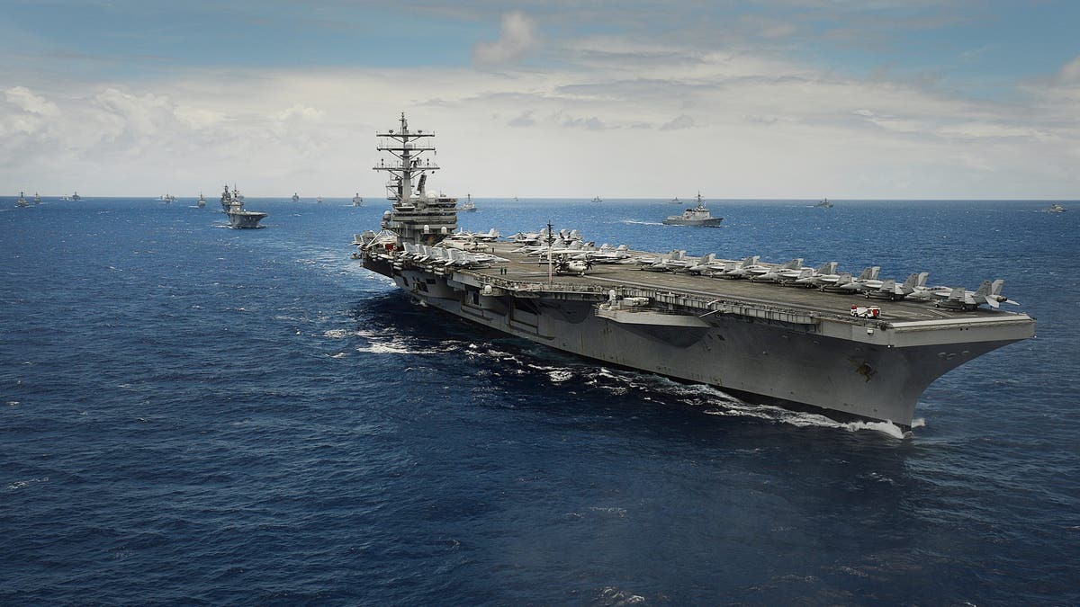 The USS Ronald Reagan is pictured above.