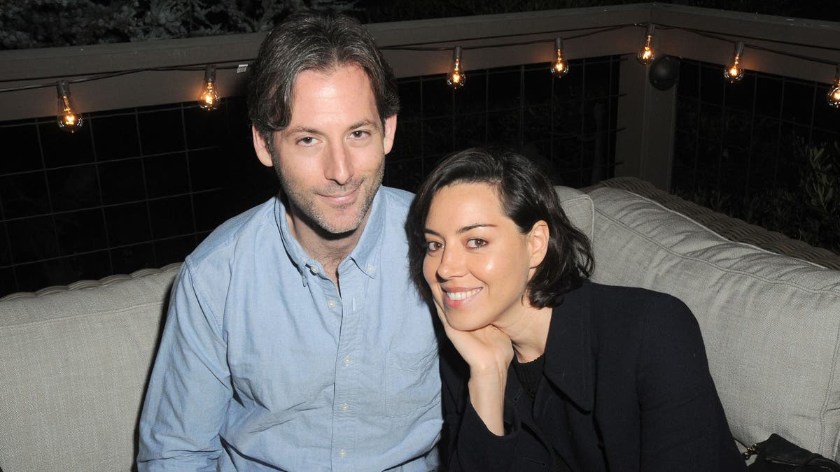 Jeff Baena, Aubrey Plaza on couch