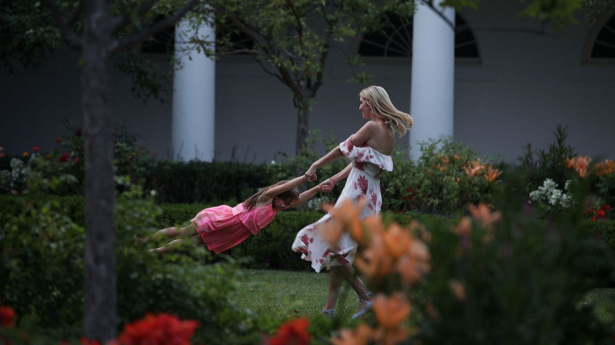 Ivanka Trump and daughter playing at the white house