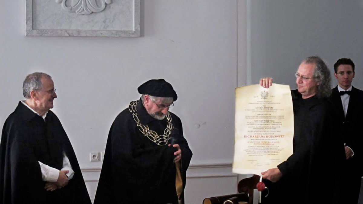 Ryszard Horowitz receives an honorary doctorate at the University of Warsaw, Poland. Photo courtesy Ryszard Horowitz.