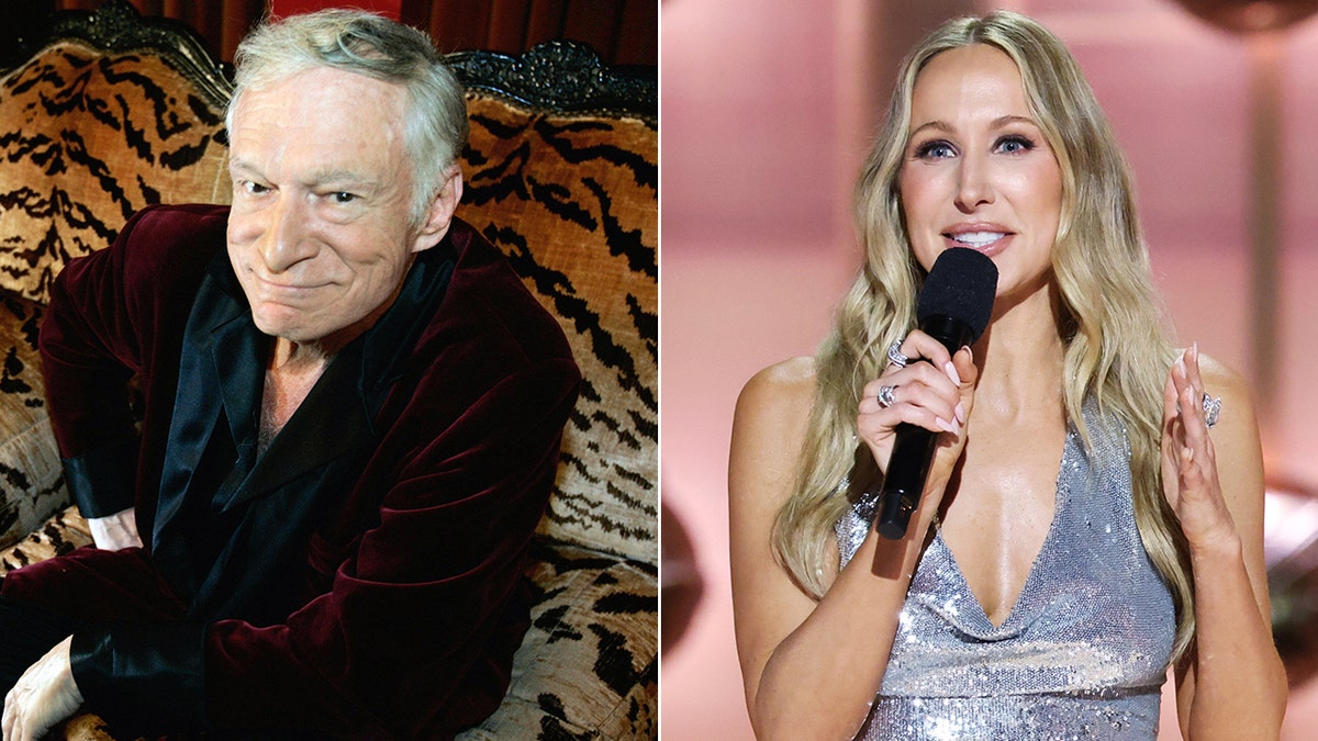 Hugh Hefner, wearing his signature burgundy velvet robe, smiles sweetly and looks up as he sits on a leopard-print sofa, and Nikki Glaser in a sparkling silver dress speaks into the microphone during the Golden Globe Awards.