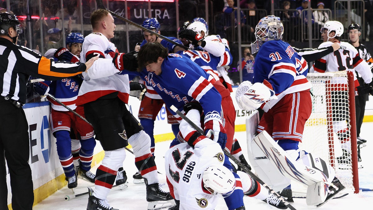 Igor Shesterkin confronts Brady Tkachuk