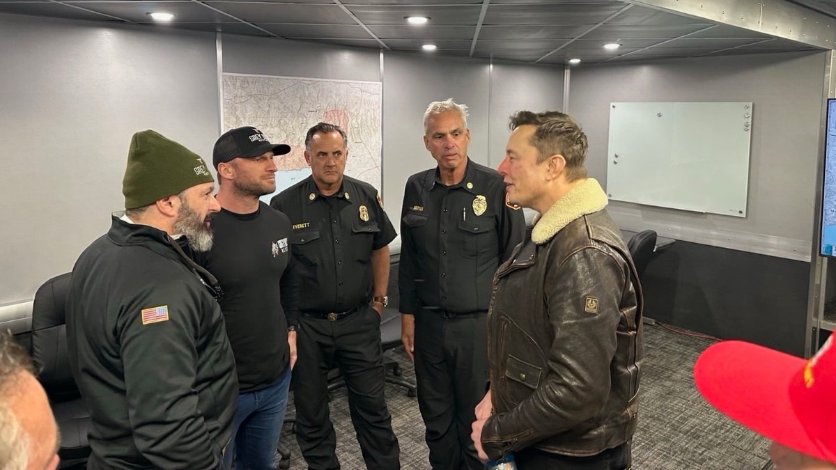 Elon Musk speaks with first-responders, volunteers