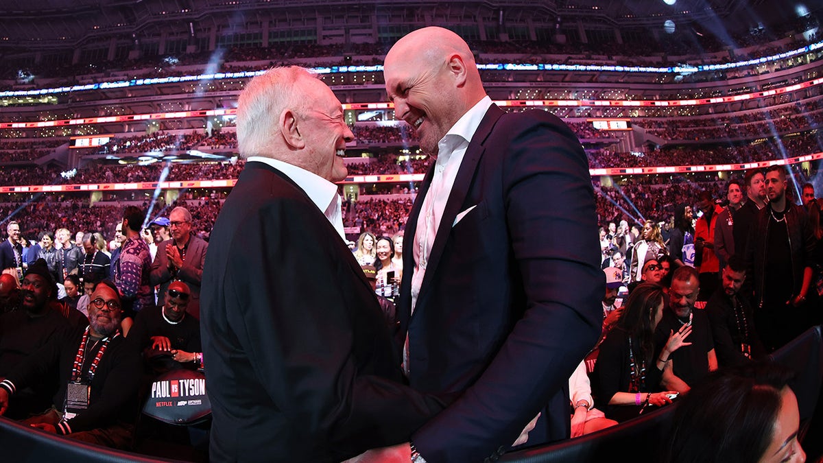 Jerry Jones and Jason Witten attend an event