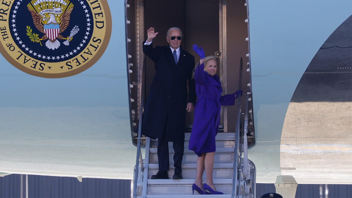 Former President Joe Biden and former First Lady Jill Biden wave to supporters as they depart Joint Base Andrews