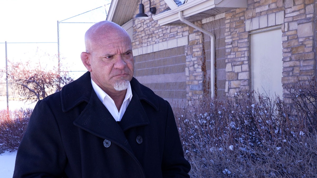 John Fabricato stands in Aurora Park