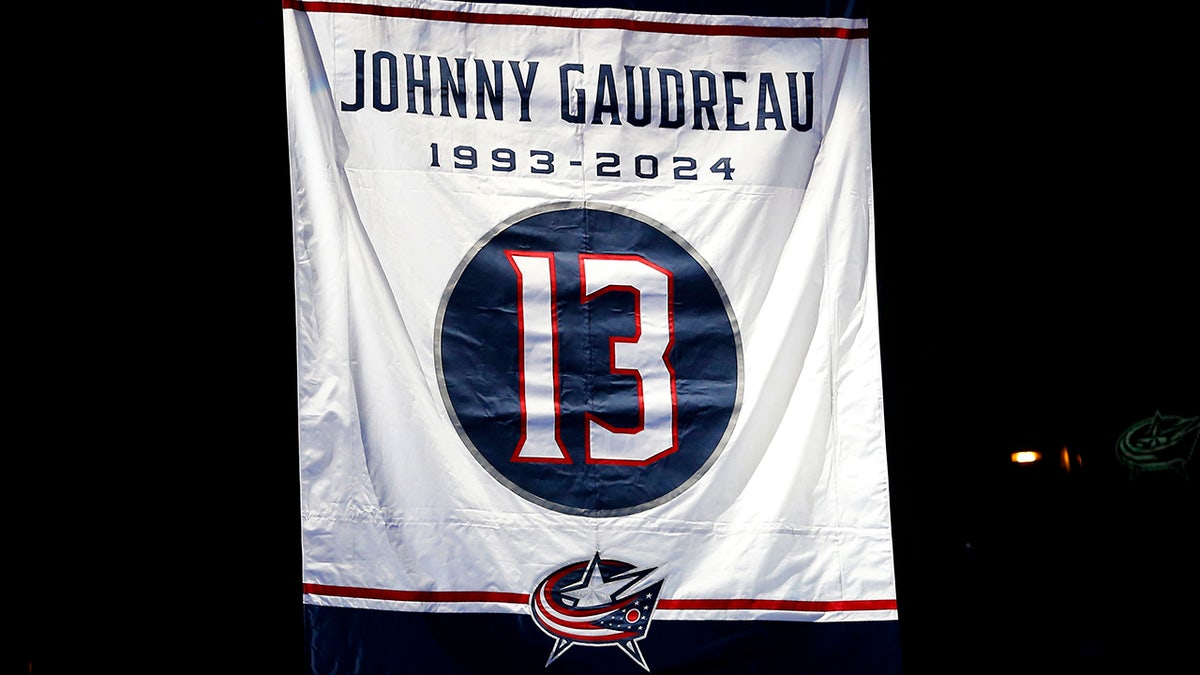 A banner honoring Johnny Gaudreau