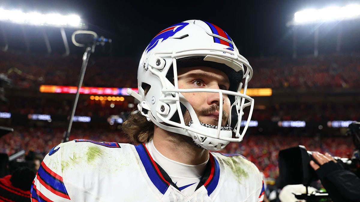 Josh Allen walks on field after loss