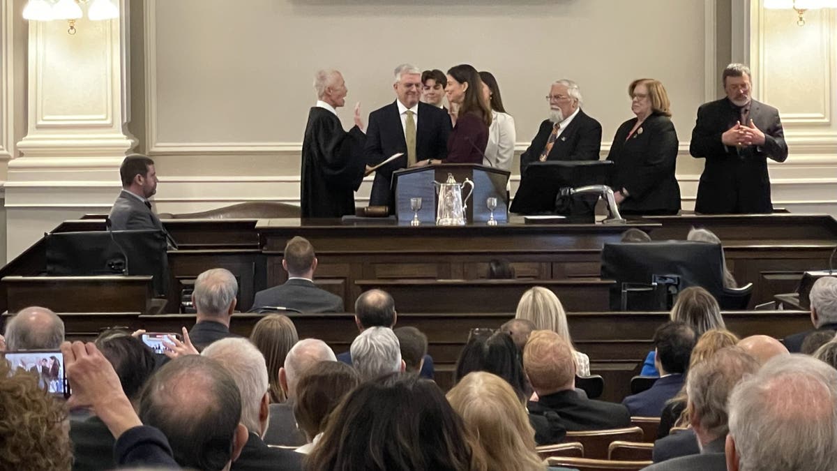 New Hampshire Gov. Kelly Ayotte is sworn in in Concord.