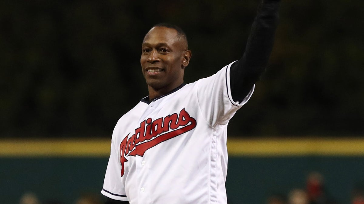 Kenny Lofton throws first pitch