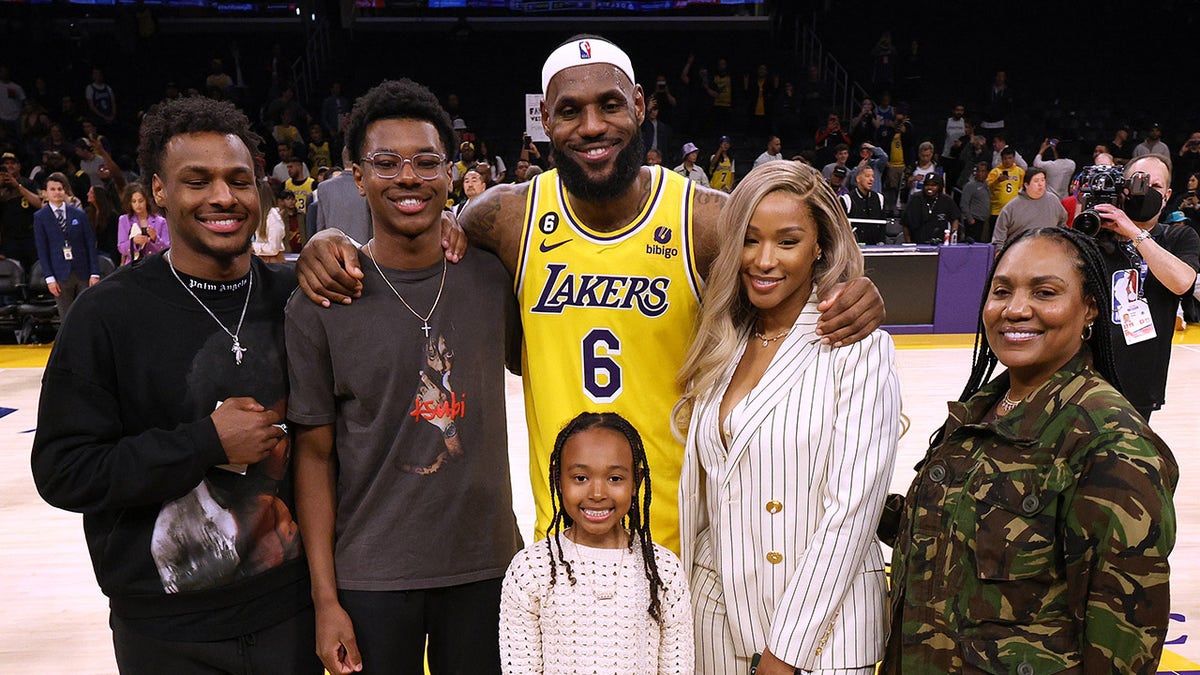 LeBron James poses with family