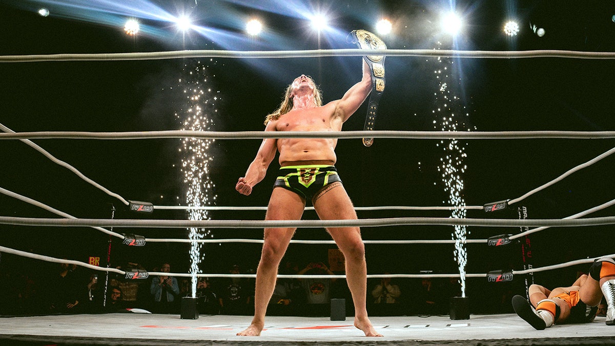 Matt Riddle celebrates