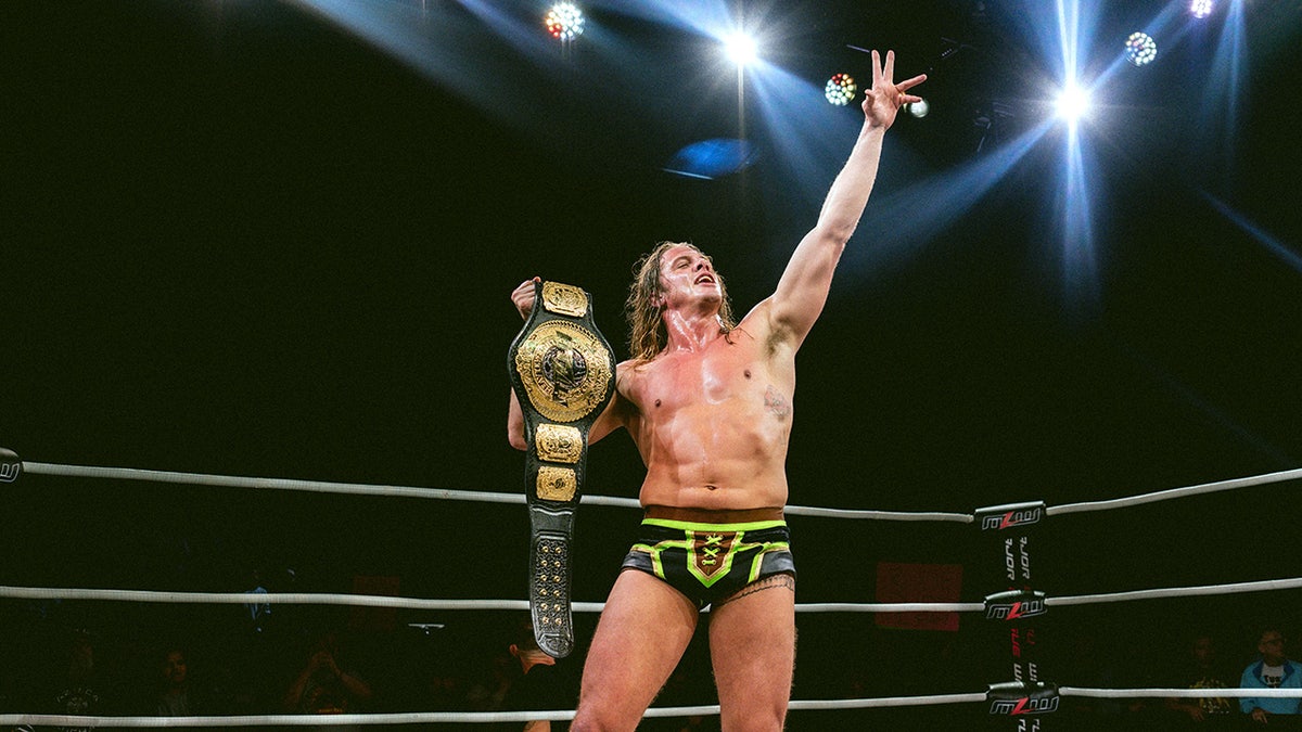 Matt Riddle with the MLW title