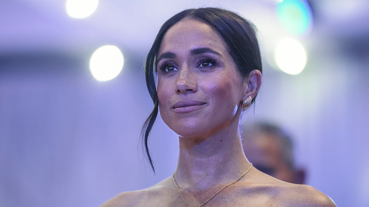 Duchess of Sussex Meghan Markle wears a strapless dress