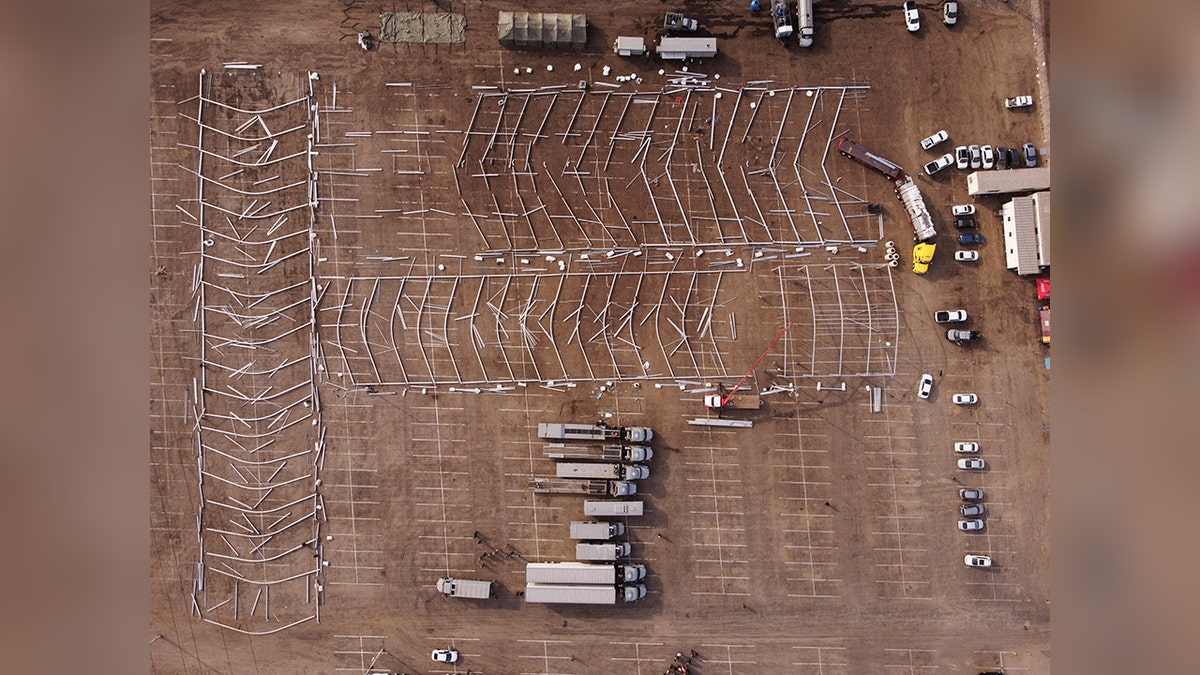 Tall metal supports are placed where temporary shelters for migrants will be built in Mexico, aerial view