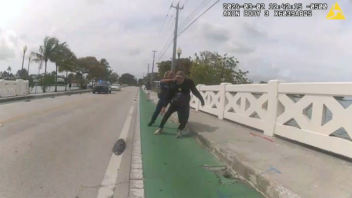 Body camera shots officer Strenger try to hold Cristobal Garcia