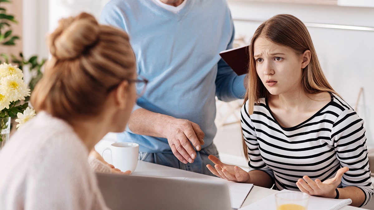 mom talking to daughter about costs