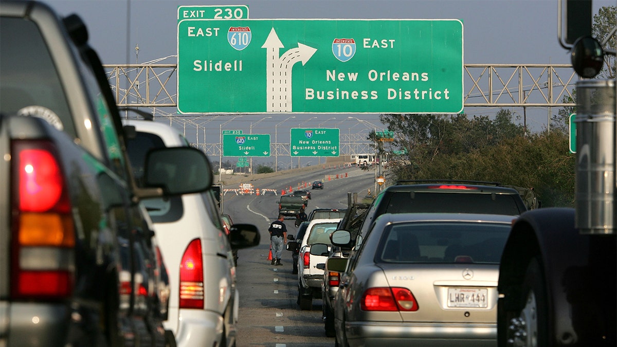 Cars were photographed trying to enter New Orleans on Interstate 10.