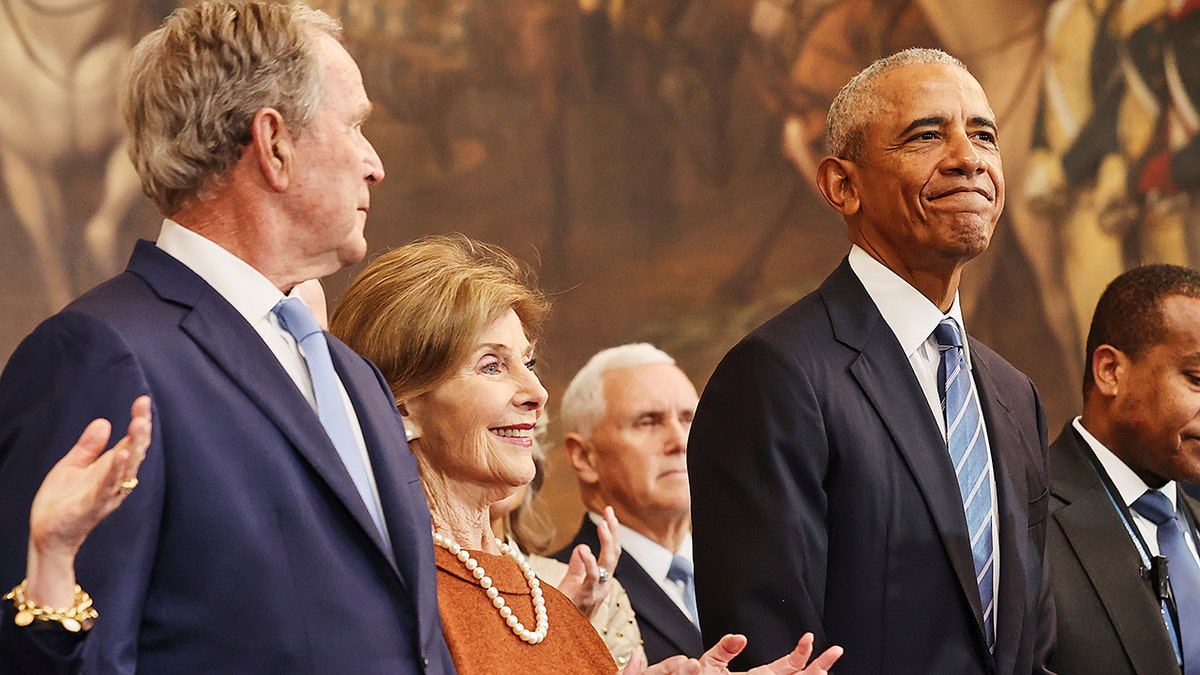 President George W. Bush, erstwhile  archetypal  woman  Laura Bush and erstwhile  President Barack Obama