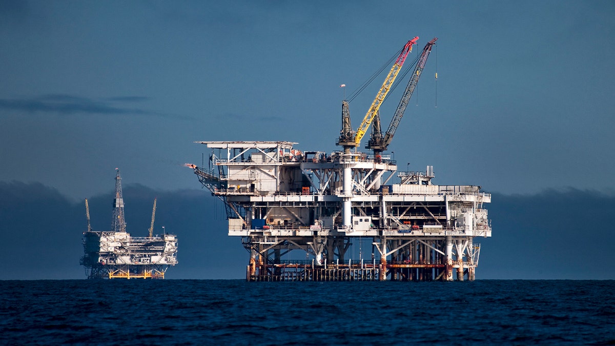 DCOR LLC's Edith offshore oil and gas platform, right, and Beta Operating Company LLC's Eureka oil and gas platform stand in the Beta Field off the coast of Long Beach, California, on Tuesday, May 18, 2010.