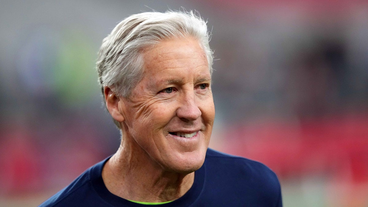 Pete Carroll watches