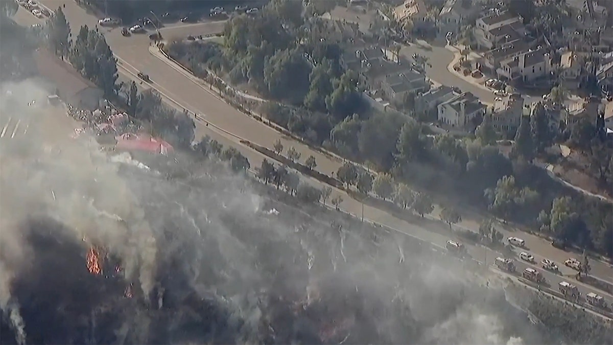 Brush fire threatening homes near San Diego