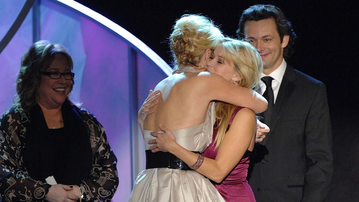 Reese Witherspoon and Kate Winsat embrace