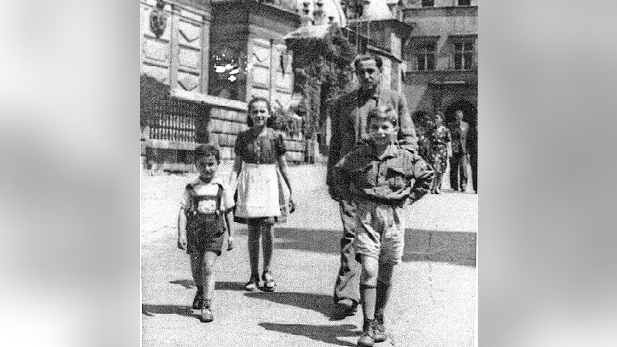 Ryszard Horowitz, Niusia Horowitz-Karakulska and Roman Polanski enjoying a day at Wawel Royal Castle in Kraków, with Roman’s uncle. Photo courtesy Ryszard Horowitz.