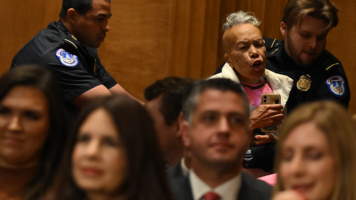 Protester escorted out of Rubio confirmation hearing