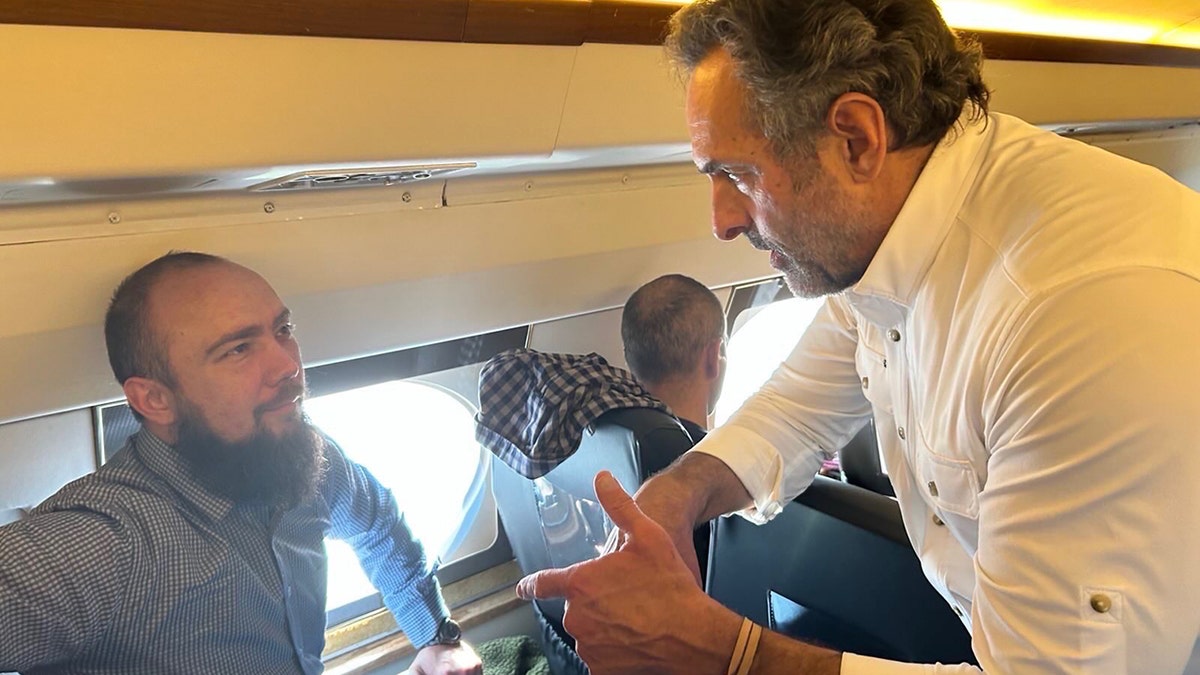 Ryan Corbett on a plane