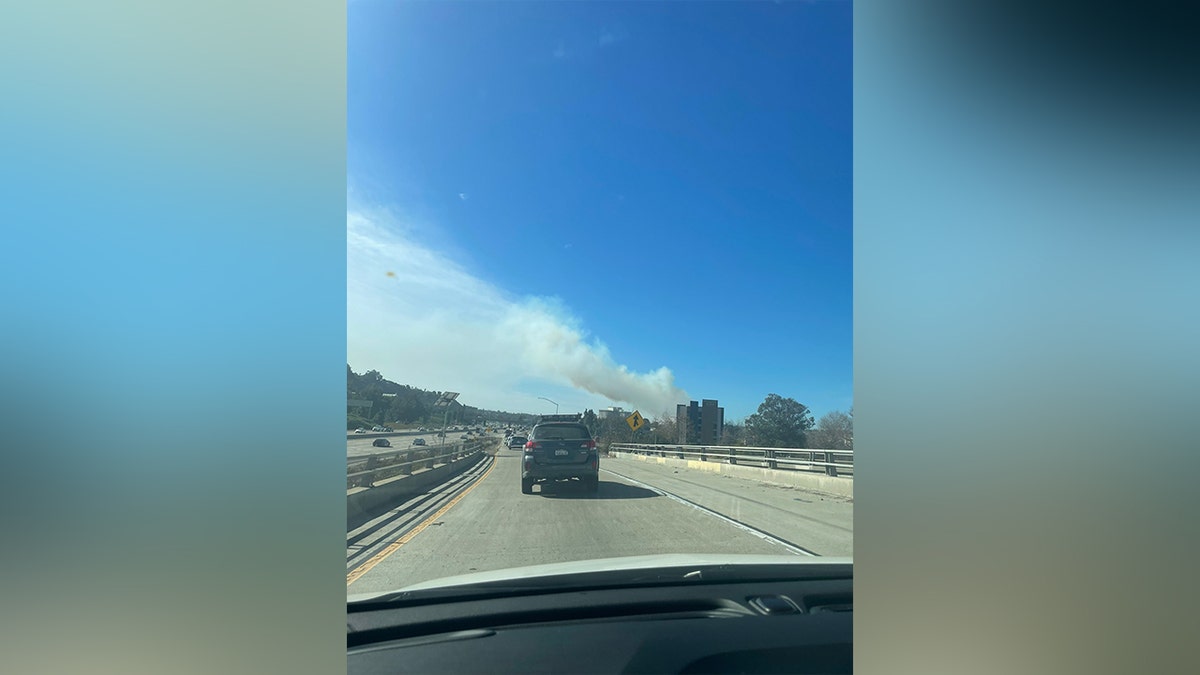 A fire in San Diego just off the 163 freeway heading into Fashion Valley