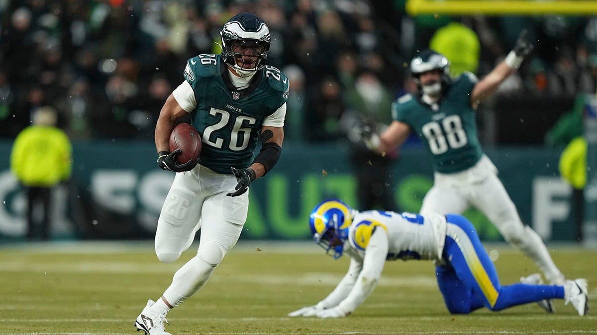 Saquon Barkley carves up Rams defense in snow, Eagles move to NFC title game