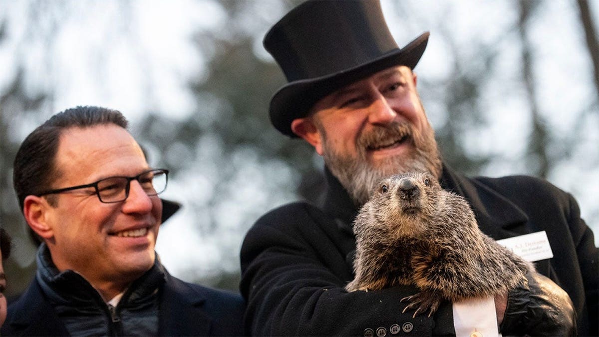 Pennsylvania governor Josh Shapiro on the left appears with Punxsutawney Phil. (Getty's pictures)