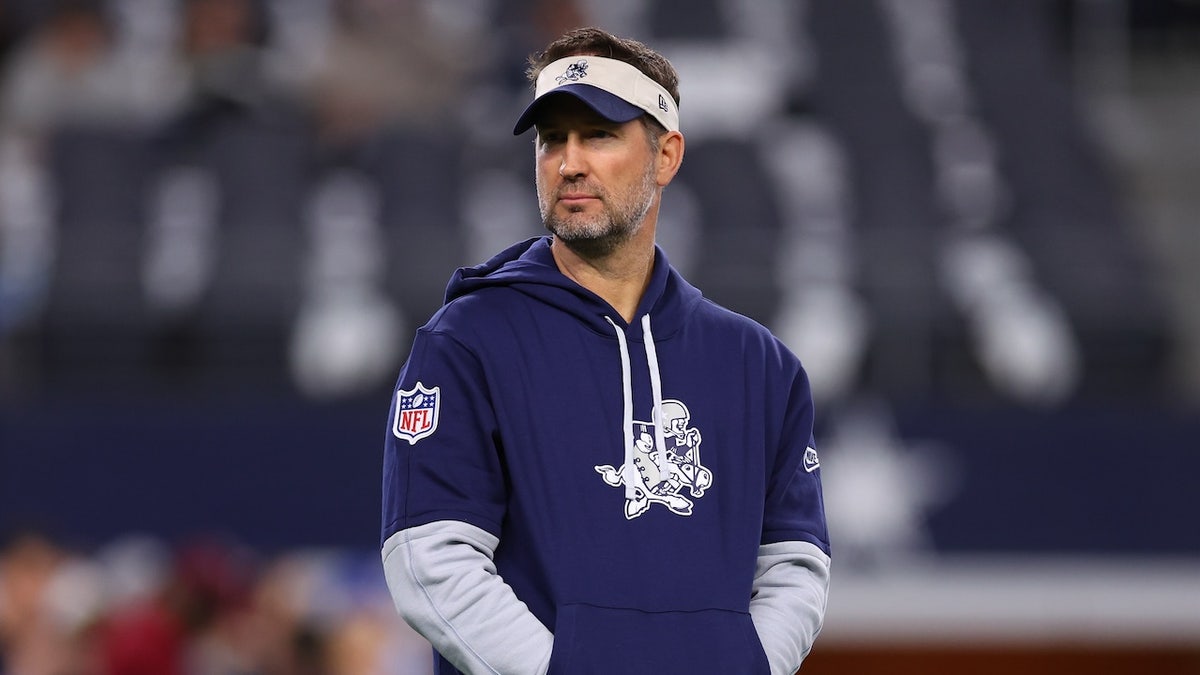 Dallas Cowboys offensive coordinator Brian Schottenheimer looks on prior to the game against the New York Giants at AT&amp;T Stadium on November 28, 2024 in Arlington, Texas. 