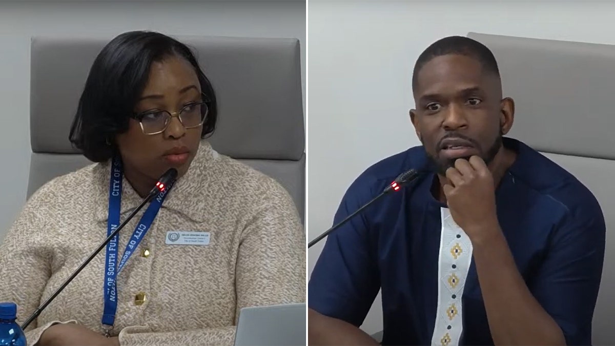  Helen Willis and Khalid Kamau side by side during city council meeting