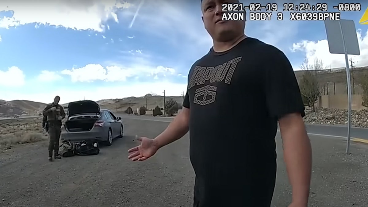 Body cam showing Stephen Lara with serviceman  going done  car   successful  background