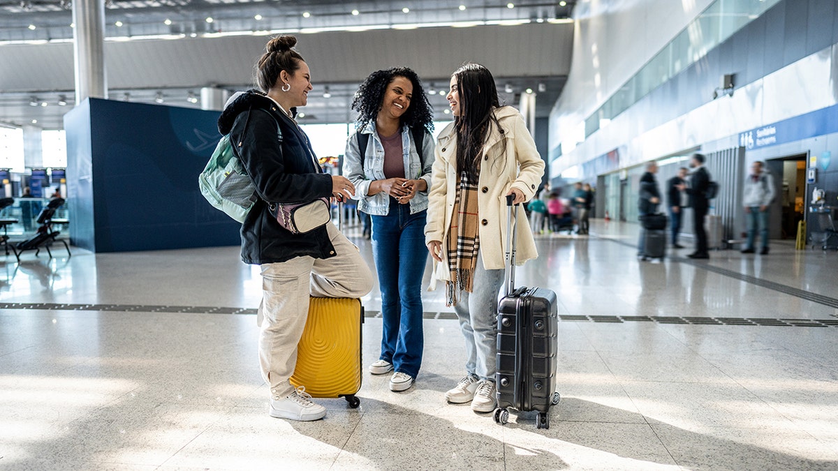 Teenage girls at the airport